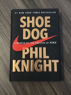 Nike Shoe Dog Book Cover — Black with Gold and Red Accents